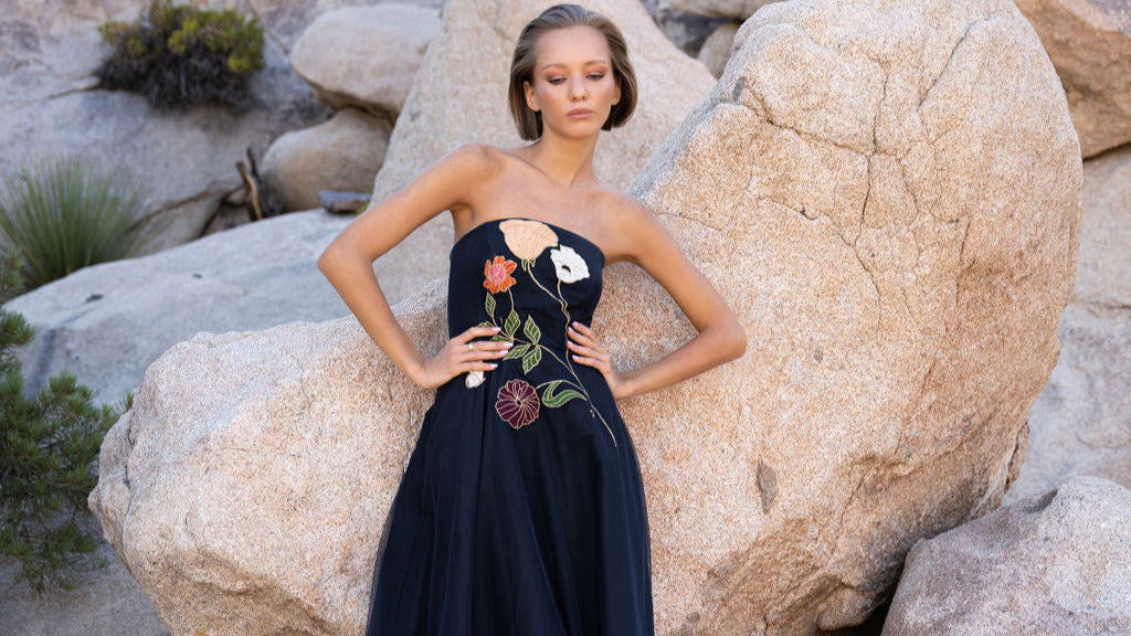Freya Strapless Midi Dress in navy with embroidered floral design