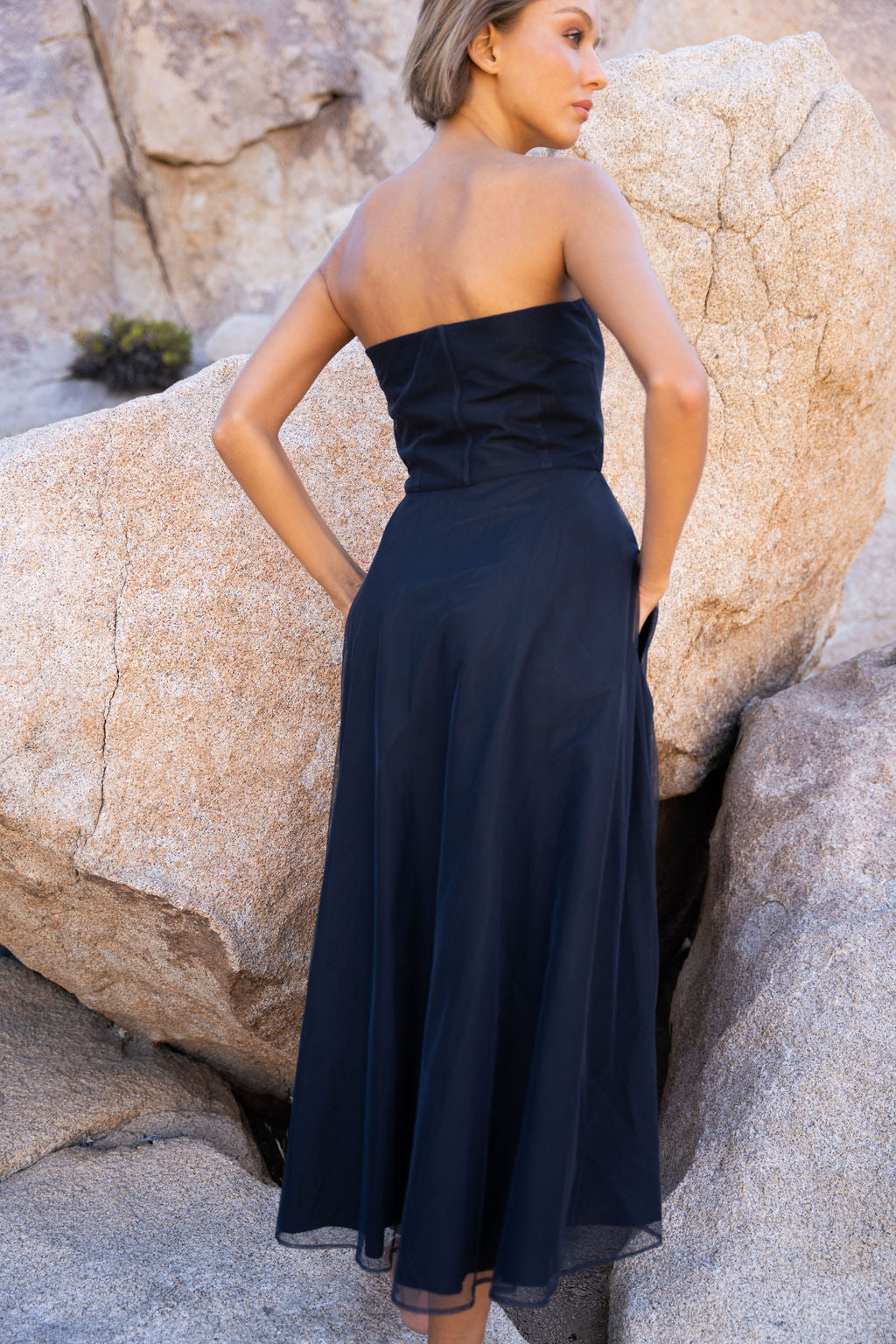 Freya Strapless Midi Dress in navy with embroidered floral design