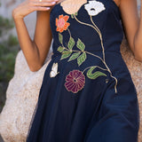 Freya Strapless Midi Dress in navy with embroidered floral design