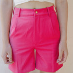 details of bright pink womenswear shorts