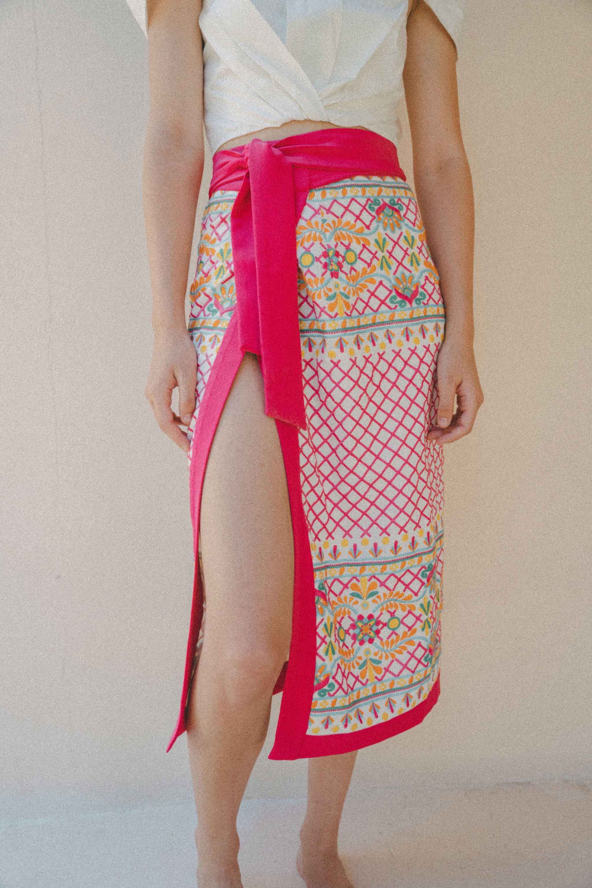 colourful embroidered sarong with pink border