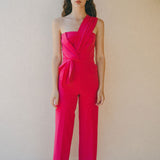 bright pink jumpsuit with pleat detail