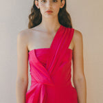 bright pink jumpsuit, pleat details