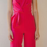 bright pink jumpsuit with pleating detail