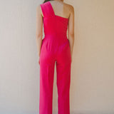back of bright pink jumpsuit