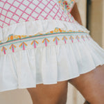 close up of embroidered skirt frill