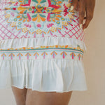 colourful embroidered skirt with white frill