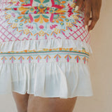 colourful embroidered skirt with white frill