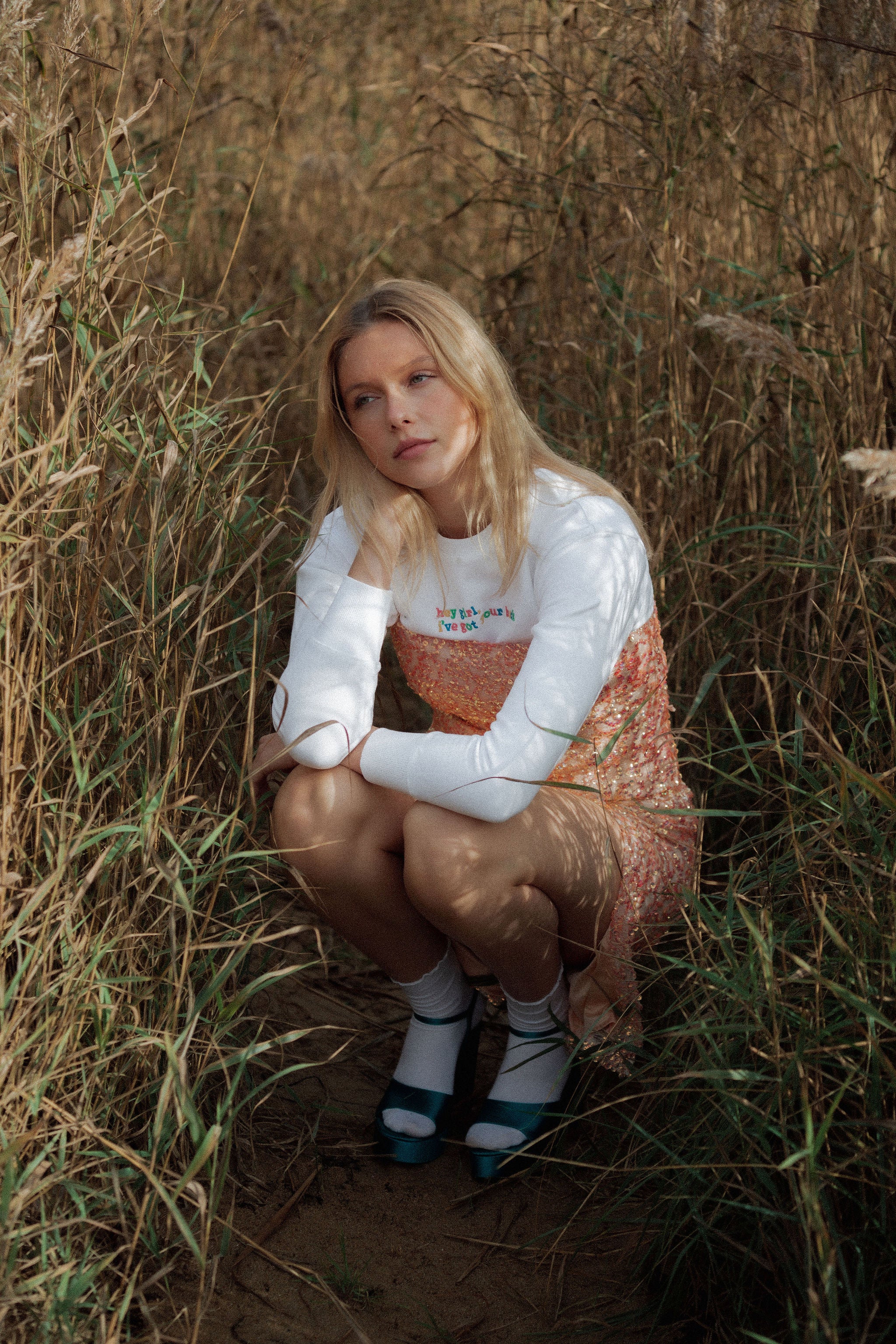 White organic cotton womens sweatshirt with the slogan "Hey girl, I've got your back" embroidered