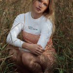 White organic cotton womens sweatshirt with the slogan "Hey girl, I've got your back" embroidered