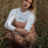 White organic cotton womens sweatshirt with the slogan "Hey girl, I've got your back" embroidered