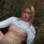 White organic cotton womens sweatshirt with the slogan "Hey girl, I've got your back" embroidered