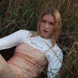 White organic cotton womens sweatshirt with the slogan "Hey girl, I've got your back" embroidered