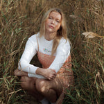 White organic cotton womens sweatshirt with the slogan "Hey girl, I've got your back" embroidered