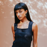 The Kōr Ribbed Knit Organic Cotton Sleeveless Top in Black