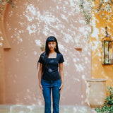 The Kōr Ribbed Knit Organic Cotton Short Sleeve Top in Black