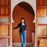 The Kōr Ribbed Knit Organic Cotton Long Sleeve Top in Black
