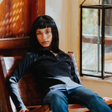 The Kōr Ribbed Knit Organic Cotton Polo in Black