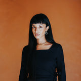 The Kōr Organic Cotton Ribbed Knit Tied Dress in Black