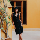 The Kōr Organic Cotton Ribbed Pinafore Dress in Black