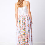 Back view of colorful embellished box pleated maxi skirt and top with zip detail