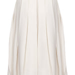 Back view of box pleated flared white skirt with belt