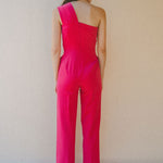 back of bright pink jumpsuit