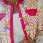 embroidered colourful jacket with pink border and pockets