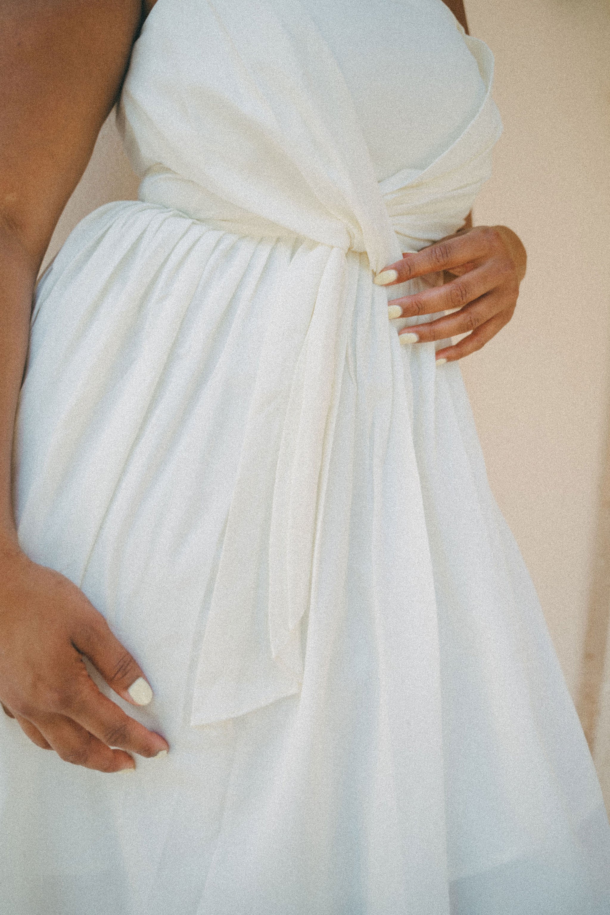 white summer dress close up pleating detail