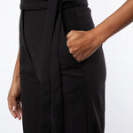 Close up pocket detail of black jumpsuit
