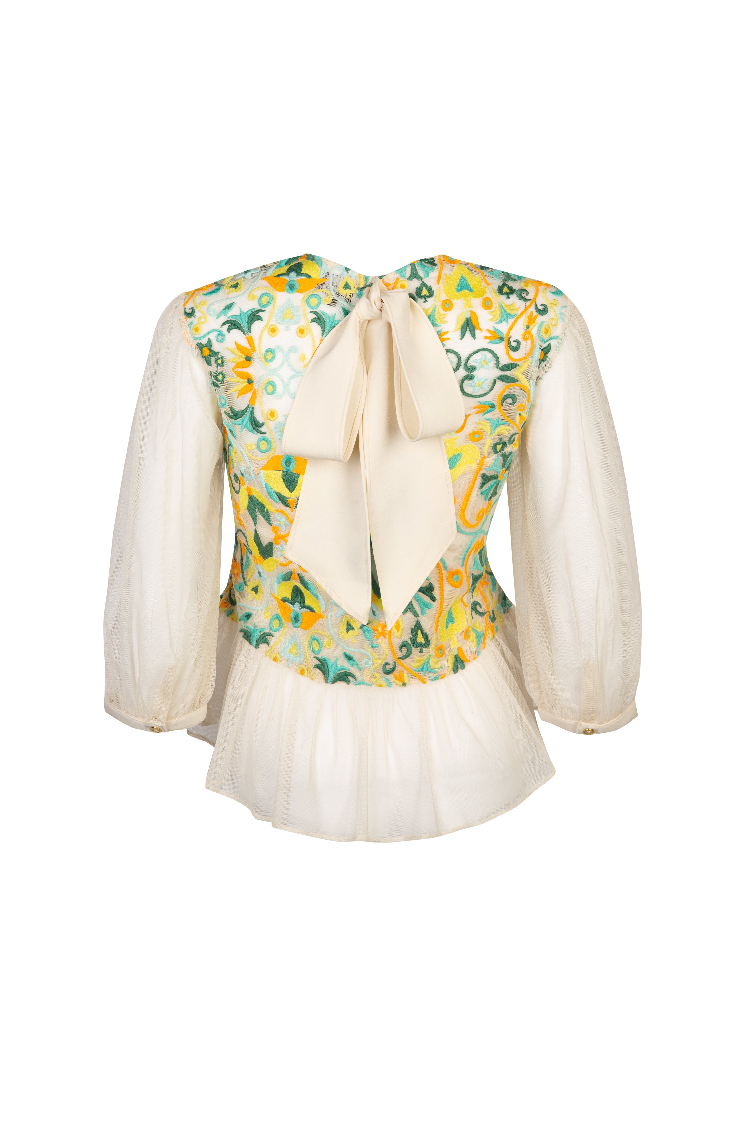 Back view of bright and colourful embroidered top with bow detail